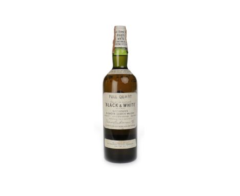 BLACK & WHITE SPRING CAP - FULL QUARTBlended Scotch Whisky1 Quart, 86.8° proof.   CONDITION REPORT:  Light wear to label, oth