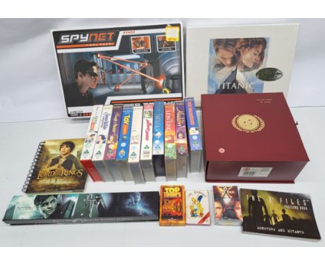 Assortment of VHS inc sealed Titanic Widescreen Boxset, Star Trek 30th anniversary boxset, Disney VHS tapes, with Harry Potte