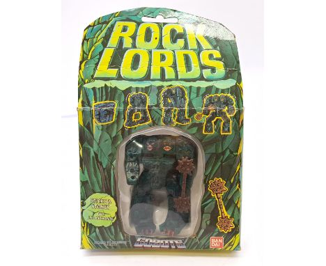 Bandai Rock Lords Gobots Sticks &amp; Stones action figure, unchecked for completeness or correctness, within opened fair pac