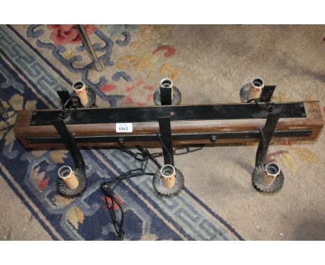 A French Oak and metal six sconce centre Light Fitting.