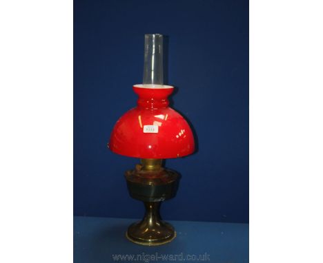 An Aladdin style Oil Lamp with cherry glass shade
