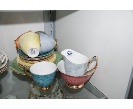 A Royal Albert Gossamer Tea Set comprising of five Cups, five Saucers, five Tea Plates, Sugar Bowl, Mild Jug and Cake Plate