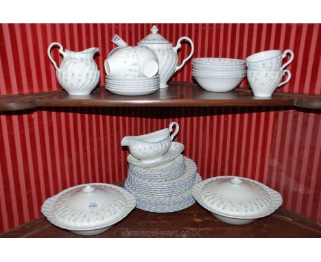 A Johnson Brothers Dinner / Tea Service with pink and blue forget-me-not pattern.  Six place setting  and including Tea Pot, 
