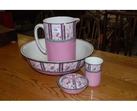 A Royal Staffordshire Wilkinson Ltd. Bedroom ware Bowl, Jug, Soap Dish and Beaker in a pink and cherry blossom pattern, a/f