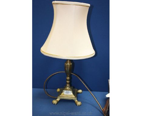 A Brass Table Lamp and shade.