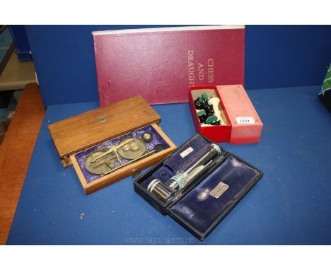 **A Victorian lens viewer in original box, a travelling Apothecary Scales and weights; and a Pepys series Chess set and board