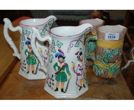 A pair of Majolica style Jugs, plus a pair of lustre Jugs with raised hunting figures