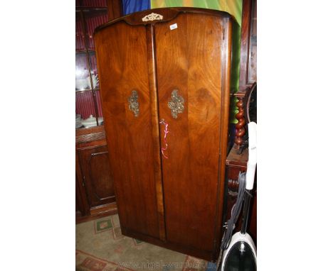 A small Mahogany two door Gent's Wardrobe with hanging and shelf space