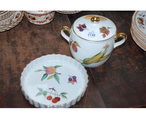 A Royal Worcester 'Evesham' two handled pot with lid and a flan dish.