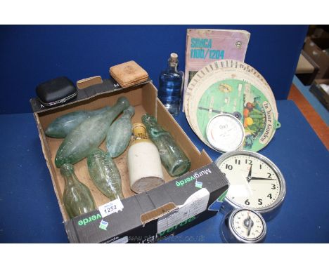 A quantity of old Bottles including 'Nassau Street, Westlakes Ltd', 'H.A. Smith, Newport', plus Clocks, thermometer, ultra le