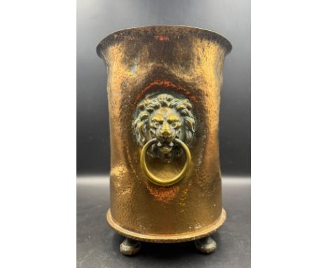 A Berndorf Trench Art planter with lion head handles on four feet, Height approximately 25cm, Shell dated for 1916