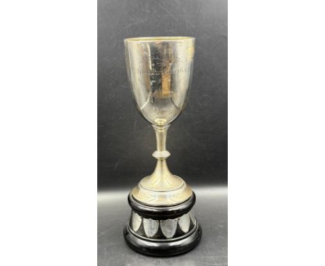A silver trophy on stand, engraved for Richmond Police Swimming Club 1909, hallmarked for Birmingham 1908 by William Hutton &