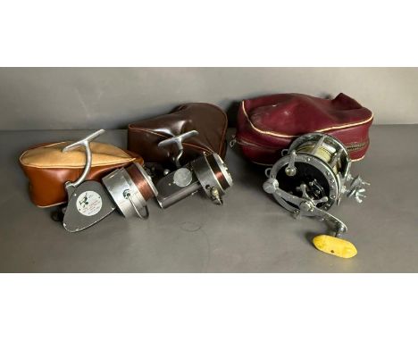 Three cased fishing reels, a Penn Senator 4/0, a vintage Hardy Bros "The Altex" and a Hardy Bros "The Exalta" 