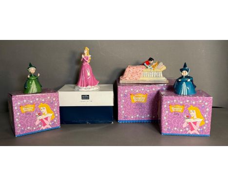 Four Royal Doulton Disney showcase collection Sleeping Beauty figures to include Merry Weather, Fauna and Loves First Kiss, b
