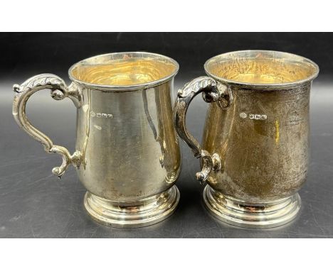 Two engraved silver tankards, with an approximate combined weight of 355g both hallmarked for Sheffield 1938 by William Hutto