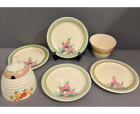 Anemone pattern plates, Art Deco cup by British ceramic artist and pottery Wilkinson and Co, Clarice Cliff, stamped for Wilki