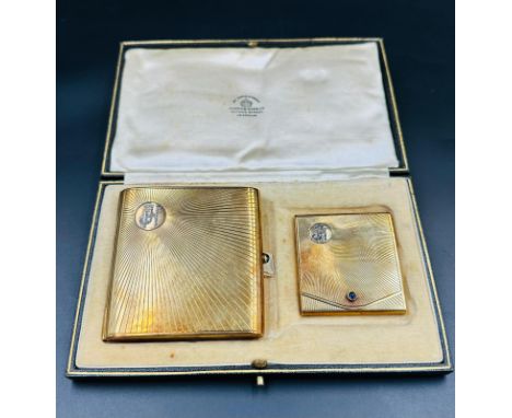 A 14ct gold set of cigarette case and matching matchbox holder, with cabochon fastener and initials JH in white stones approx