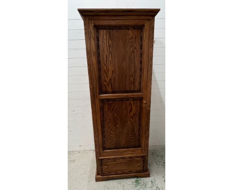 Single wardrobe with drawer to base, copper plaque to reverse (H200cm W76cm D55cm)