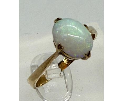 A 9ct gold opal ring, approximate size N.5 and weight 2g