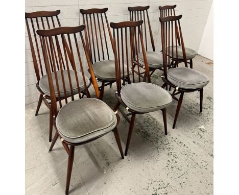 Seven Ercol Windsor chairs with seat pads