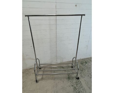 A chrome hanging rail with shelf to base (H160cm W120cm)