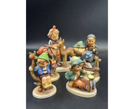 A selection of six Hummel figurines 