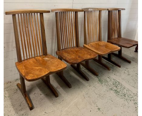 Four spindled back chairs sculpted cantilevered seats on sled feet in the style of Mira Nakashima Conoid chairs 