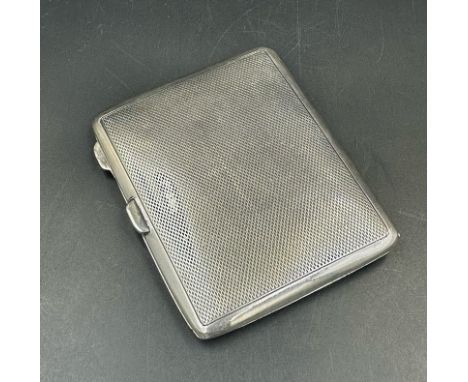 A machine tooled cigarette case by Mayes, Mills & Co, hallmarked for Birmingham 1936