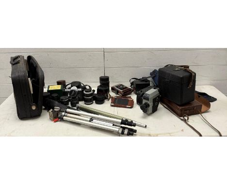 A selection of vintage cameras and camera equipment to include a Pentax Asahi SP with lenses an Erision slate camera and a po