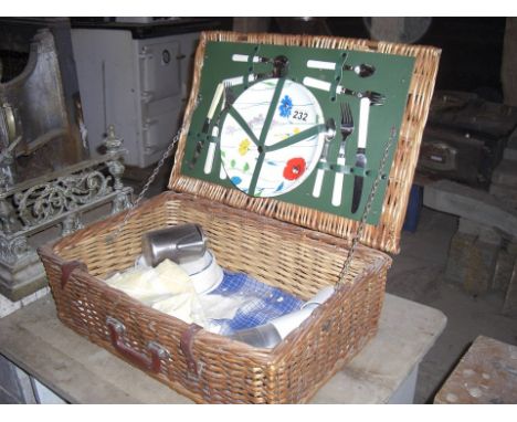 Wicker picnic hamper with contents