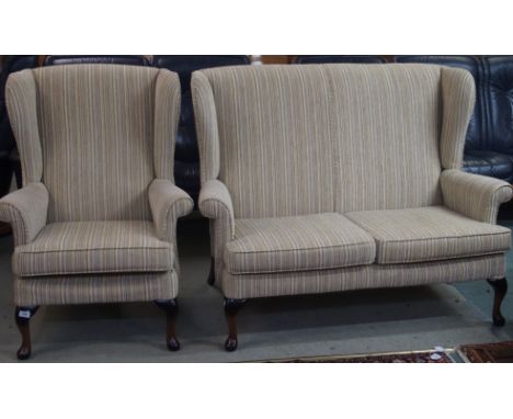 A Parker Knoll two seater sofa, 100cm high x 133cm wide with matching armchair (2) Condition Report: Available upon request