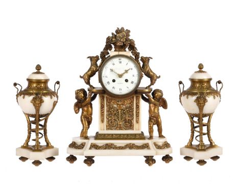 A FRENCH NAPOLEON III LOUIS XVI STYLE ORMOLU MOUNTED CARRERA MARBLE MANTEL CLOCKIndistinctly signed, Paris, mid 19th centuryT