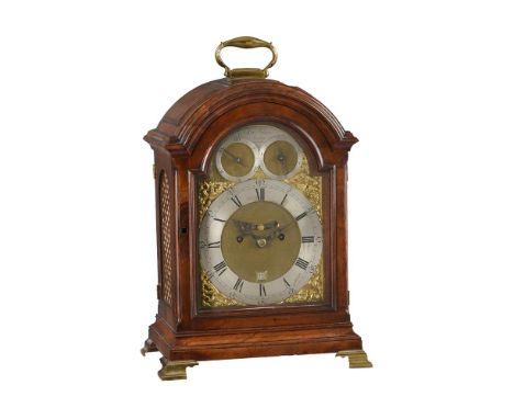 A GEORGE III FIGURED MAHOGANY TRIPLE PAD-TOP TABLE CLOCKAlexander Wilson, London, circa 1775The five pillar twin fusee bell s