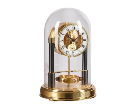 A GILT AND OXIDISED BRASS 150 YEAR ANNIVERSARY ATMOS TIMEPIECEJaeger-LeCoultre, Switzerland, 1984The skeletonised fourteen je