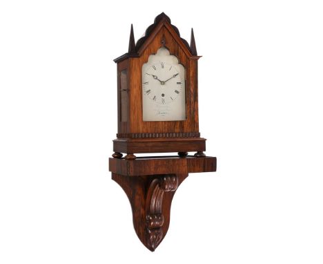 Y AN EARLY VICTORIAN ROSEWOOD SMALL GOTHIC BRACKET TIMEPIECE WITH WALL BRACKETCummins, London, circa 1840The four pillar sing