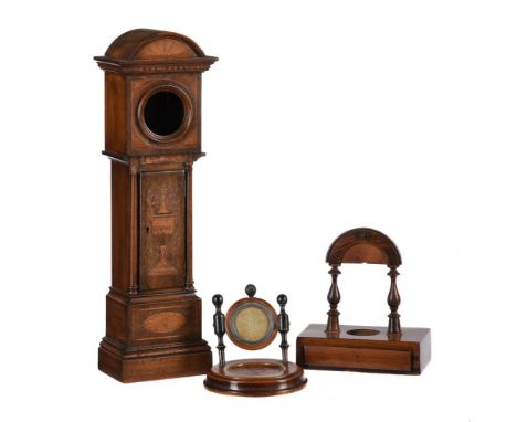 Y A LATE VICTORIAN INLAID ROSEWOOD WATCHSTAND IN THE FORM OF A MINIATURE LONGCASE CLOCKAnonymous, late 19th centuryThe arched