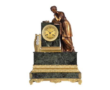 A FRENCH EMPIRE ORMOLU AND VERDE ANTICO MARBLE FIGURAL MANTEL CLOCKJean-François Denière, Paris, early 19th centuryThe circul