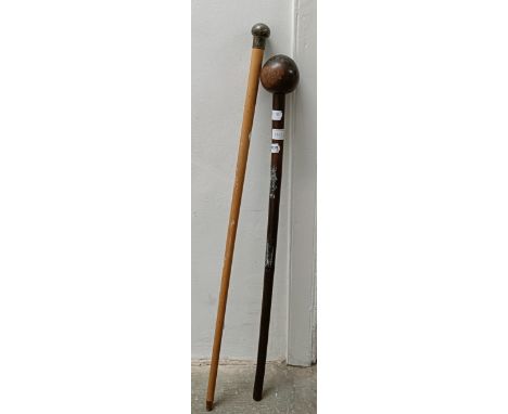 A silver mounted walking stick, and another (2) 