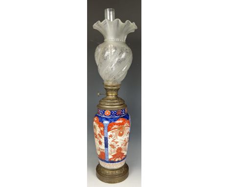 A Japanese Imari vase, converted to an oil lamp, with an acid etched glass shade, 46 cm high, and another (2) 