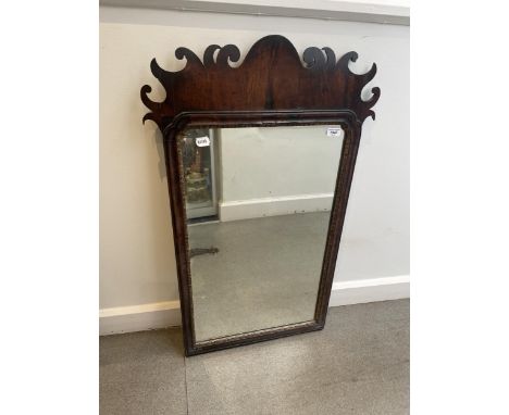 A mahogany fret framed mirror, 97 x 59 cm 