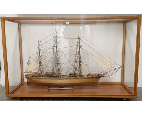 A model of the Cutty Sark, in a teak and perspex case, 140 cm wide 
