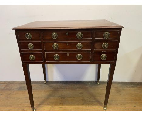 A 19th century mahogany enclosed dressing table, with a folding top revealing a fitted interior with an adjustable mirror, ab