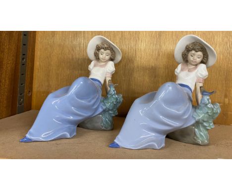 Matching Vintage Nao figures of a girl on a rock with a bird, height 6 inches 