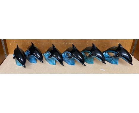 Selection of 6 Poole Pottery swimming Dolphin figures 
