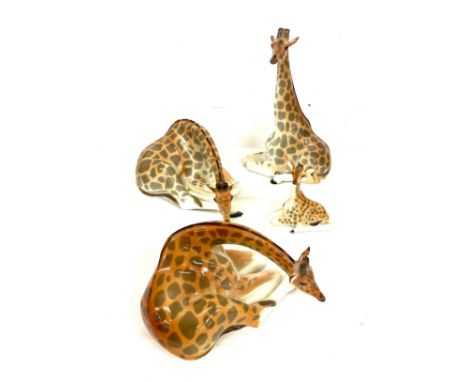 Selection of Vintage USSR pottery Giraffe figures includes 2 Laying down and 2 standing up Tallest 30cm tall 