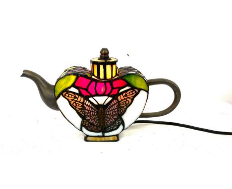 Tiffany style tea pot lamp in working order, approximate measurements:  Height 6 inches, spout to handle 10 inches 