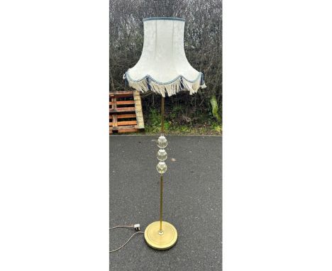Brass and glass standard lamp, working