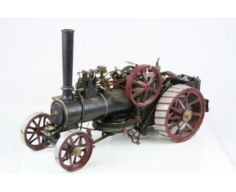 Large well built steam engine, metal, in black with maroon, approximately 2 foot in length, outside length of back wheels 11"
