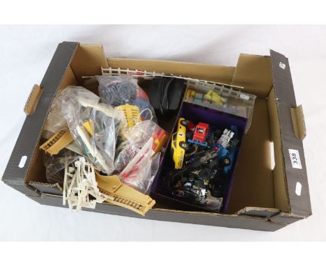 11 Scalextric slot cars to include CO53 Datsun in blue, C050 John Player Special etc (condition varies) plus spares, repairs,