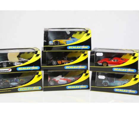 Seven cased Scalextric slot cars to include C2398 Reanault R23 F1 Fernando Alonso No 8, C2367 MG Lolo Knighthawk No 30, C2456